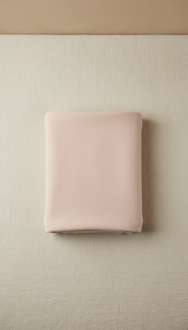 Blush cream swaddle blanket